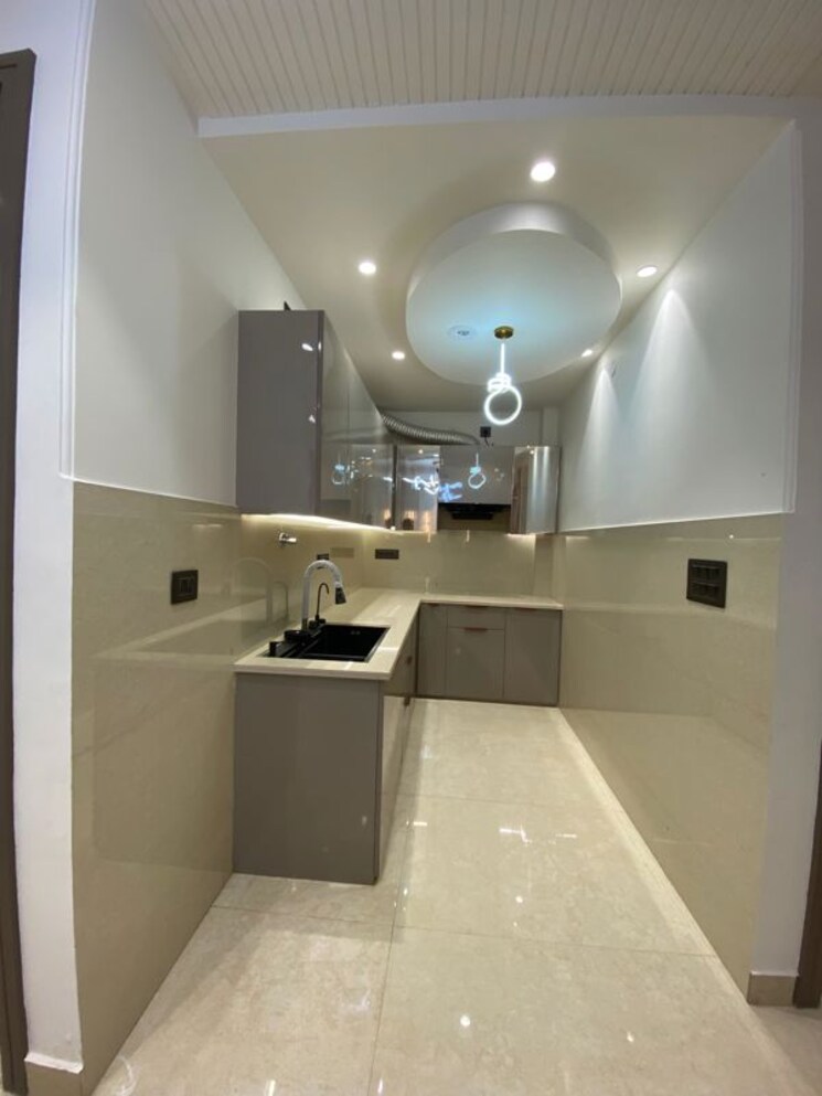 Kitchen, dwarka mor 3 Bedroom 100 Sq.Yd. Builder Floor In Dwarka Mor Delhi 9802831
