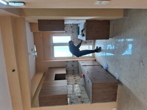 Kitchen in 2 BHK Apartment at Aims Golf City, Sector 75 – for Rent