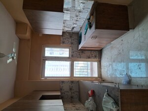 Kitchen in 2 BHK Apartment at Aims Golf City, Sector 75 – for Rent