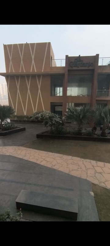 Living Room in 2.5 BHK Apartment at Migsun Green Mansion, Zeta I Greater Noida – for Sale