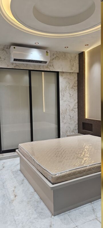 Bedroom in 2 BHK Apartment at Dev Leo Tower, Oshiwara – for Rent