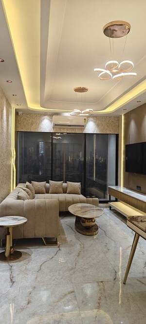 Living Room in 2 BHK Apartment at Dev Leo Tower, Oshiwara – for Rent