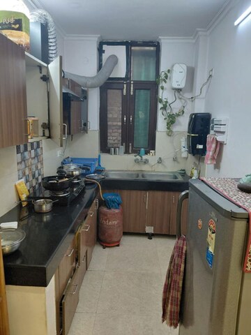 Kitchen in 2 BHK Builder Floor at Shri Devaji Residency, Dhakoli – for Rent