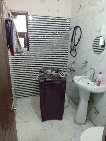 Bathroom in 2 BHK Builder Floor at Shri Devaji Residency, Dhakoli – for Rent