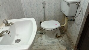 Bathroom in 2 BHK Apartment at Ramprastha Society, Ramprastha Greens – for Rent