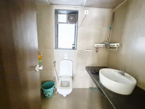 Bathroom in 3 BHK Apartment at Runwal My City, Dombivli East – for Rent