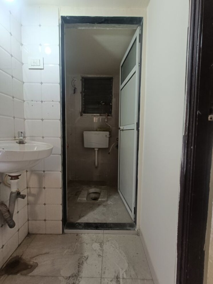 Bathroom, seven-apna-ghar-phase-2-plot-b 1 Bedroom 504 Sq.Ft. Apartment In Mira Road Thane 9806430