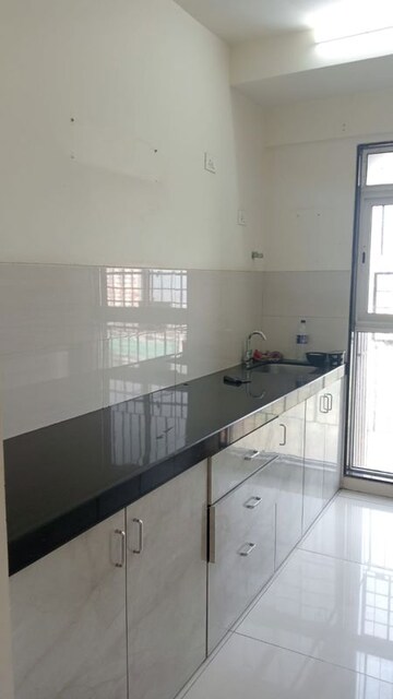 Kitchen in 1 BHK Apartment at Godrej Nest Kandivali, Kandivali East – for Rent