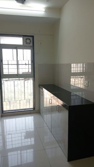 Kitchen in 1 BHK Apartment at Godrej Nest Kandivali, Kandivali East – for Rent