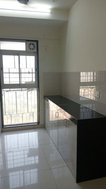 Kitchen in 1 BHK Apartment at Godrej Nest Kandivali, Kandivali East – for Rent