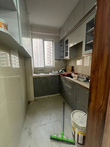 Kitchen in 2.5 BHK Apartment at Amrapali Golf Homes, Sector 4 Greater Noida – for Rent