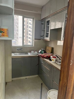 Kitchen in 2.5 BHK Apartment at Amrapali Golf Homes, Sector 4 Greater Noida – for Rent