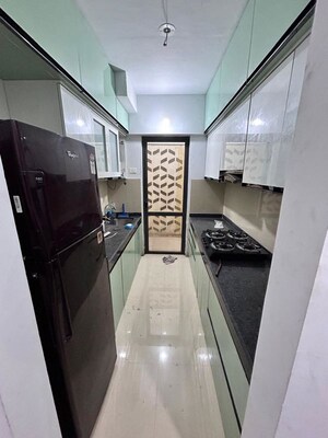 Kitchen in 1.5 BHK Apartment at Lodha Palava City Lakeshore Greens, Dombivli East – for Rent