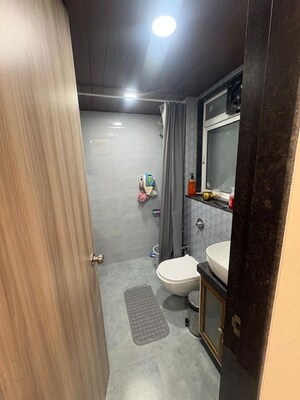 Bathroom in 1 BHK Apartment at Dimple Pinnacolo, Mira Road – for Rent