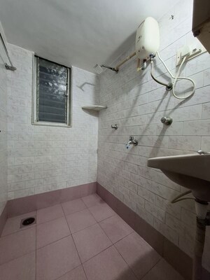 Bathroom in 1 BHK Apartment at Eden Villa CHS, Dahisar West – for Sale