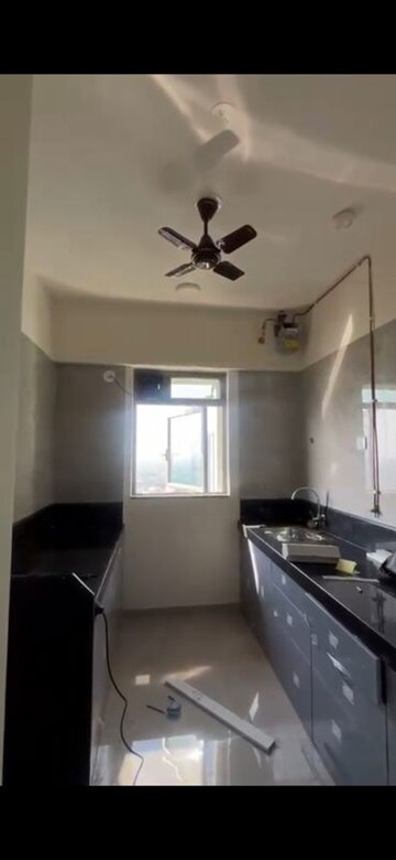 Kitchen in 2 BHK Apartment at Sheth Irene, Malad West – for Rent