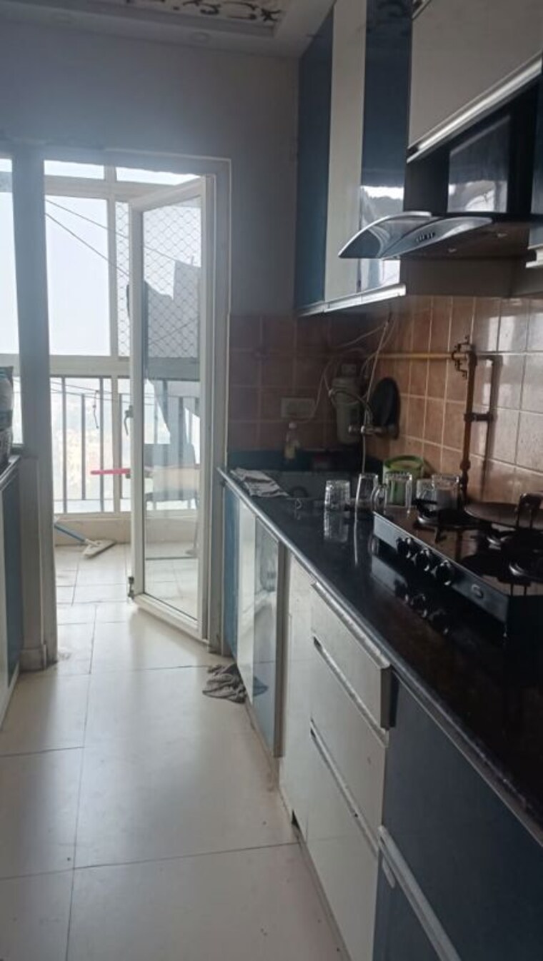 Kitchen, aims-golf-avenue-ii 2 Bedroom 1080 Sq.Ft. Apartment In Sector 75 Noida 9807120