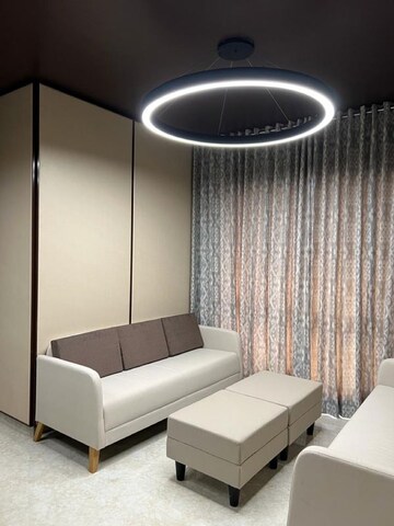 Living Room in 1 BHK Apartment at Lodha Amara, Sandoz Baug – for Sale