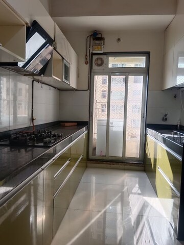 Kitchen in 2 BHK Apartment at Rustomjee Urbania Azziano, Thane West – for Rent