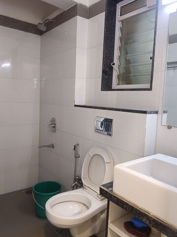 Bathroom in 2 BHK Apartment at Rustomjee Urbania Azziano, Thane West – for Rent