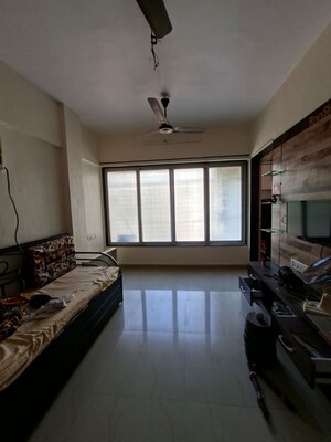 Living Room in 1 RK Apartment at Yogi Ashram, Borivali West – for Rent