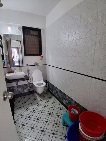 Bathroom in 2 BHK Apartment at Spring Nest, Karve Nagar – for Sale