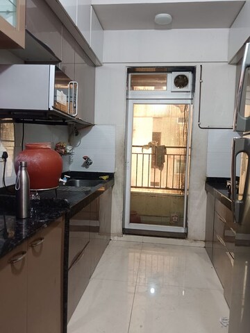 Kitchen in 2 BHK Apartment at Rustomjee Urbania Azziano, Thane West – for Rent