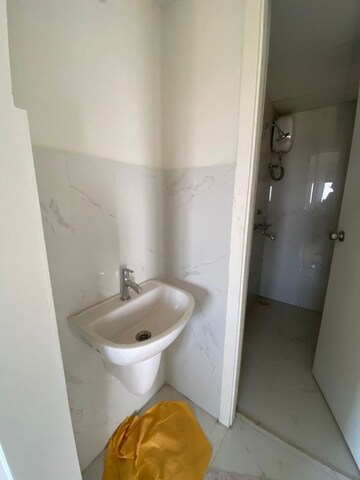 Bathroom in 1 BHK Apartment at Runwal Gardens Phase 2, Dombivli East – for Sale