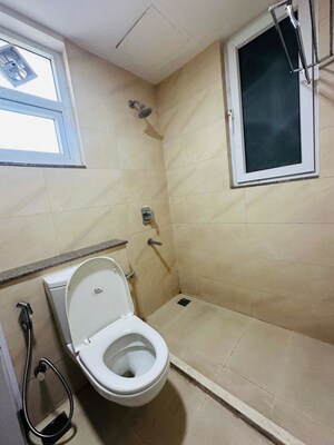 Bathroom in 3 BHK Apartment at Puri Anand Villas Phase II, Sector 81 – for Rent