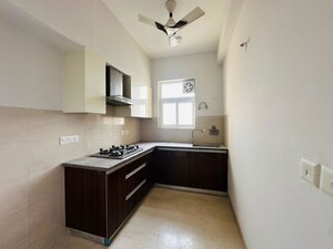 Kitchen in 3 BHK Apartment at Puri Anand Villas Phase II, Sector 81 – for Rent