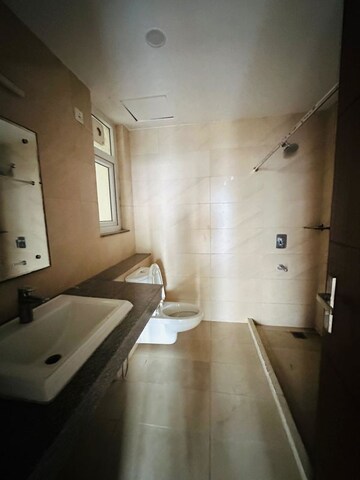 Bathroom in 4 BHK Apartment at Puri Anand Villas Phase II, Sector 81 – for Rent