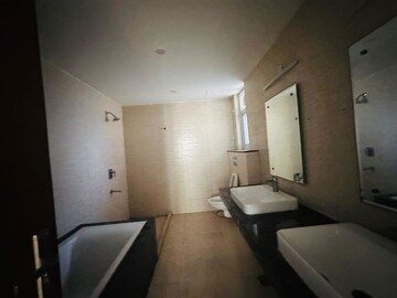 Bathroom in 4 BHK Apartment at Puri Anand Villas Phase II, Sector 81 – for Rent