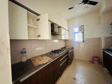 Kitchen in 4 BHK Apartment at Puri Anand Villas Phase II, Sector 81 – for Rent