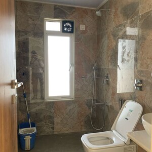 Bathroom in 3 BHK Apartment at Shraddha Elite, Poisar – for Rent