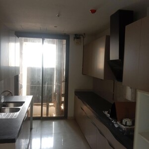 Kitchen in 4 BHK Apartment at Rustomjee Crown, Gokhale Road – for Rent