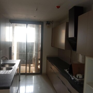 Kitchen in 4 BHK Apartment at Rustomjee Crown, Gokhale Road – for Rent