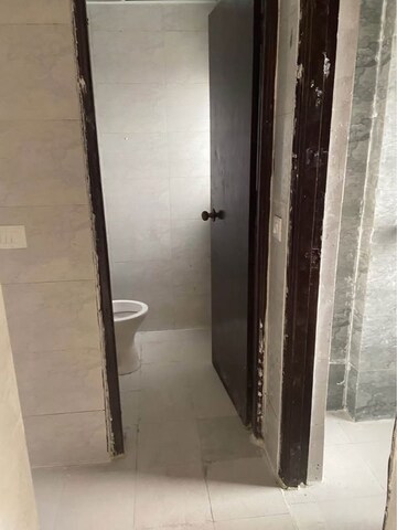 Building Lobby in 1 BHK Apartment at Amrapali Dream Valley – for Rent