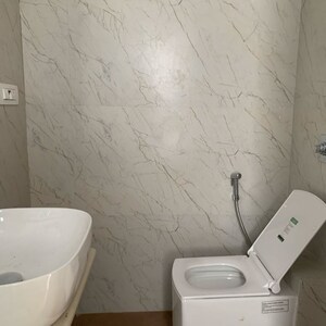 Bathroom in 2 BHK Apartment at Shraddha Elite, Poisar – for Rent