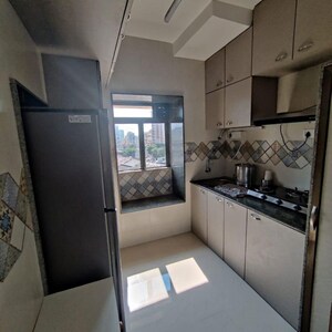 Kitchen in 4 BHK Apartment at Avighna One Avighna Park, Currey Road – for Rent