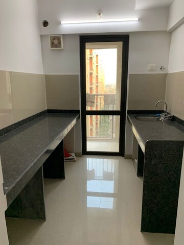 Kitchen in 1.5 BHK Apartment at Lodha Palava City Lakeshore Greens, Dombivli East – for Rent