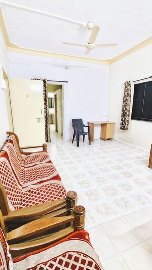 Living Room in 1 BHK Apartment at Wadgaon Sheri – for Rent