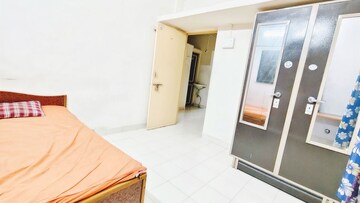 Bedroom in 1 BHK Apartment at Wadgaon Sheri – for Rent