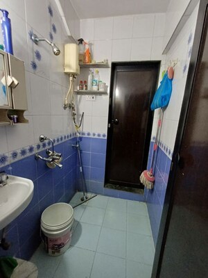 Bathroom in 2 BHK Apartment at Golden Park CHS, Kulgaon – for Rent