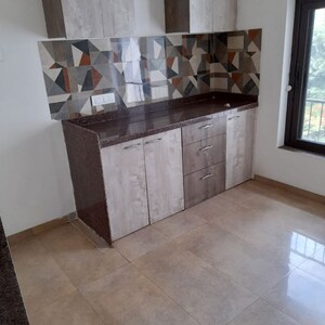 Kitchen in 2 BHK Apartment at Sonata Apartments Bandra West, Chimbai Village – for Rent