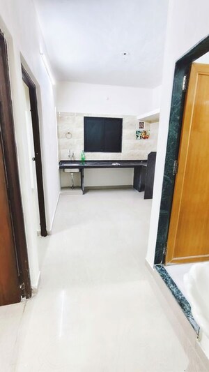 Kitchen in 2 BHK Apartment at Wadgaon Sheri – for Rent