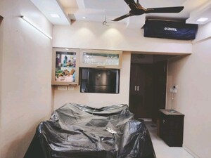 Living Room in 2 BHK Apartment at Rustomjee Azziano Wing K, Thane West – for Rent