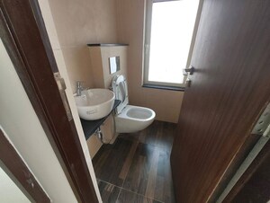 Bathroom in 1 BHK Apartment at Omkar Signet, Malad East – for Rent