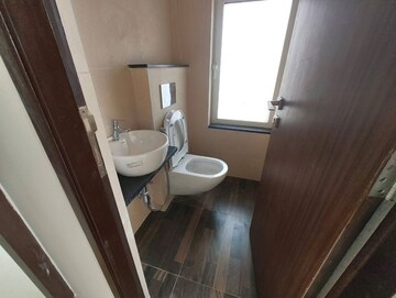 Bathroom in 1 BHK Apartment at Omkar Signet, Malad East – for Rent