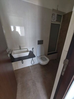 Bathroom in 1 BHK Apartment at Omkar Signet, Malad East – for Rent