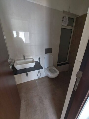 Bathroom in 1 BHK Apartment at Omkar Signet, Malad East – for Rent